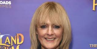 Jane Moore looks ready for spring in elegant floral dress