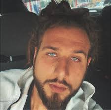 Travis Kelce speaks about Taylor Swift, via GQ.