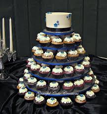 Black And Blue Wedding Cake Royal Blue And Black Cupcake Wedding Cake A Photo On Flickriver Wedding Cakes With Cupcakes Wedding Cake Pictures Wedding Cupcakes
