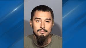 Man arrested breaking- 12p