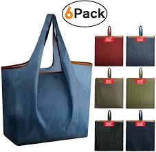 Material is polyester fabric and its size is 15.5 x 15 not counting the handle portion. Earthwise Collapsible Reusable Grocery Bag 3 Pack
