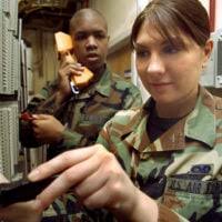 At the post and relief ceremony, the traditional passing of the NCO sword,  held at Marine Corps Air Station (MCAS) Futenma, Okinawa, Japan. Sergeant  Major (SGTMAJ) Frankie Holmes, USMC, (right), takes the