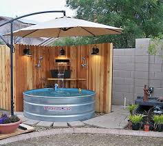 Galvanized Stock Tank Turned Diy Pool What Do You Think Of This Backyard Pool Simple Pool Stock Tank Pool Diy Stock Tank Swimming Pool