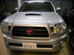 Pink Painted Toyota Grille Emblem Dscn4128 Jpg Tacoma Gallery Toyota Emblem Toyota Toyota Symbol