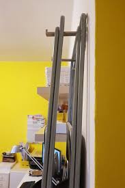 Gunde Bjarnum Ikea Hack How To Store Folding Chairs With Style Contemporary Home Decor Restoration Hardware Dining Chairs Home Decor