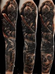 This tattoo includes a black and white inked lion's face with two roses below the lion. 30 Great Full Sleeve Tattoos By Maksims Zotovs
