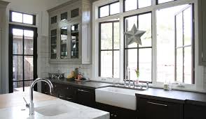 In case stainless steel is your choice as well, consider adding glass panels. 2 Tone Kitchen Cabinets Contemporary Kitchen Castor Architecture