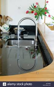 tap fitting into kitchen sink set
