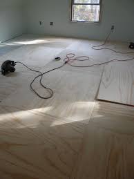 Plywood is generally considered to be a subflooring wood choice but paint the floor using a roller. Plywood Floor Going Down Diy Flooring Painted Plywood Floors Plywood Flooring