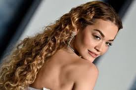 The Only Thing Smaller Than Rita Ora's Pleated Miniskirt Was Her  Underboob-Baring Crochet Bra Top