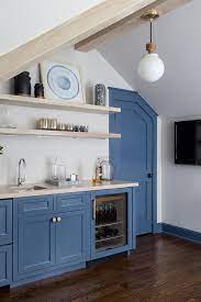 Explore the kitchen cabinets designs from top brands, materials, type, style and choose according to your choices and requirements. Attic Kitchenette With Blue Cabinets Transitional Kitchen