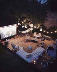 Project from only 8' 9 away! 20 Cool Backyard Movie Theaters For Outdoor Entertaining