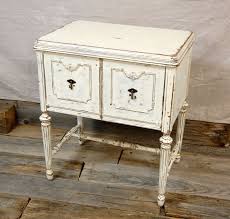 Vintage Sewing Cabinet Storage Side Table With Creamy White Distressed Finish 320 00 Via Etsy Sewing Cabinet Vintage Side Table Repurposed Furniture