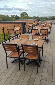 Our wooden furniture are available in various stains like natural beech walnut, wenge dark oak, oak ebony black, mahogany and in custom paint finishes. Our Atlantic Outdoor Furniture Collection On A Rooftop Bar Restaurantfurniture Outdoo Commercial Patio Furniture Outdoor Restaurant Outdoor Furniture Decor