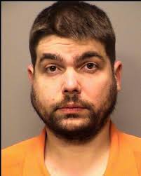 Valpo cop rescues intoxicated driver moments before train collides with  vehicle, police say