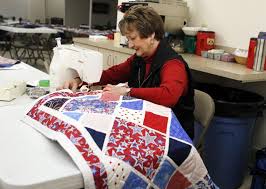Quilts of Valor members honor veterans through quilting