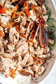 While some may say the bone adds flavor, i generally opt for boneless pork shoulder because it is all usable and you don't have a bone to deal with. Slow Roasted Pork Shoulder Savoring Italy