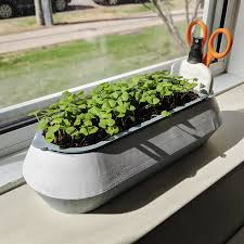 i designed a small microgreen planter
