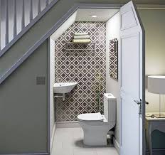 Vastu For Staircase The Space Below A Staircase Should Not Be Used As A Toilet Unique Bathroom Design Bathroom Under Stairs Bathroom Remodel Designs