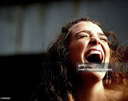 Girl Laughing High High-Res Stock Photo