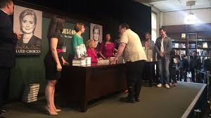 A book signing is an event, usually at a bookstore or library where an author sits and signs books for a period of time.book signing is popular because an author … Hillary Clinton Fans Wait Through Night For Book Signing Abc News