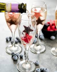 Champagne Cocktails With Festive Fruit Ice Recipe Festive Fruit Champagne Cocktail Fruit Ice