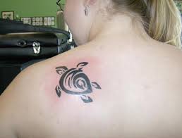 We want them to remain in our memories and become part of our lives. Small Tribal Peace Turtle Tattoo On Left Back Shoulder