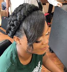 The trick to mastering a unique hairstyle for black hair is to combine different classic hairstyles into one, just like this example. Crown Braid Black Hair Designs For Your Mesmerizing Insta Pics