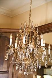 How To Clean A Chandelier Quickly And Easily Hunker How To Clean Chandelier Old Chandelier How To Make A Chandelier