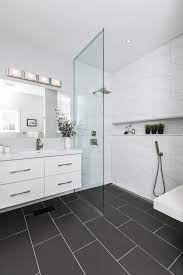 20 Impressive Black Floor Tiles Design Ideas For Modern Bathroom Black Tile Bathrooms Black Bathroom Floor Bathroom Interior Design