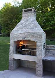 An outdoor living room features brick flooring. Backyard Brick Bbq Designs Pictures Novocom Top