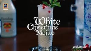 Photo about fall and winter refreshment drink, white christmas mojito cocktail with cranberry and mint, on white table, copy space top view. Video How To Make The Perfect White Christmas Mojito With Aldi Daily Mail Online