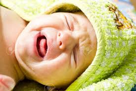 The process becomes tedious and uncomfortable even to a healthy, happy baby that loves playing with water. Crying Baby Newborn Baby Lying In A Hooded Towel After Taking A Bath And Cry Stock Photo Picture And Royalty Free Image Image 59313735