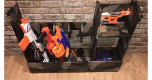 Get those builky plastic guns off the floor with the easy diy nerf gun storage idea! Nerf Gun Storage Cabinet