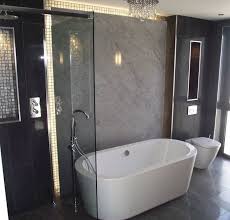 Quick and easy to fit, these 100% waterproof. Lamont Stone On Twitter Beautifully Designed Bathroom With Feature Bath Wall Panel In Carrera White Marble Lamontstone Marble Marblefeaturewall Marblewall Carrerawhite Northernireland Lovenireland Gooddesign Bathroomdesign