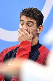 Michael Phelps wins gold in his last Olympic race in the Men's 4x100m relay 