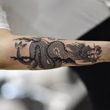 Cool black ink dragon tattoo on forearm. Satatttvision Dragon Tattoo Forearm Dragon Tattoo Designs Tattoos