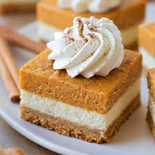 The filling is made with a vanilla cream cheese layer and a layer of lightly spiced pumpkin cream cheese. The Best Pumpkin Cheesecake Bars A Fall Favorite Lil Luna