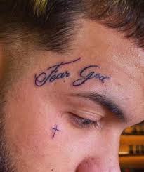 He has indian elephant tattoo on his hand and the words real life on his forearm. Anuel Aa S 16 Tattoos Their Meanings Body Art Guru
