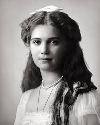 a series of formal photographs of grand duchess maria nikolaevna at the age  of fifteen, 1914