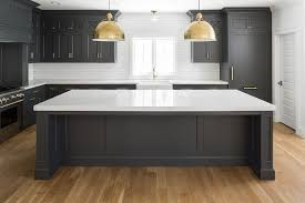 This project had miles of oak cabinetry. Hot New Kitchen Trend Dark Cabinets Subway Tile Shiplap Home Bunch Interior Design Ideas