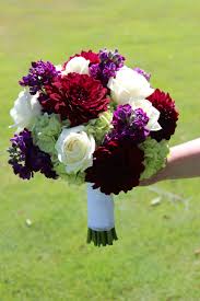Red is commonly associated with romance, and these rose, burgundy, and crimson wedding bouquets will have you head over heels. Burgundy Purple And White Wedding Flowers Red Wedding Flowers White Wedding Flowers Wedding Bouquets