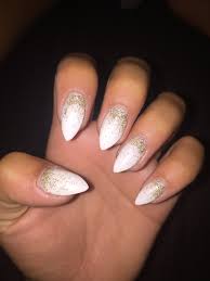 Black And Gold Ombre Stiletto Nails White Stiletto Nails With Gold Ombre Accent White Stiletto Nails White Nails With Gold Gold Acrylic Nails