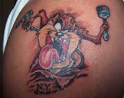 Taz tattoo clever tattoos yosemite sam looney tunes characters tasmanian devil lotus tattoo tattoo designs tattoo ideas body art tattoos. Tasmanian Devil Looney Tunes Tattoo Novocom Top