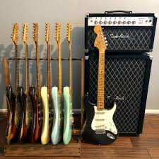 Guitars Are More Than Just Instruments While Safer When Transported Inside A Case Along With Your Picks Strap In 2020 Guitar Rack Guitar Acoustic Electric Guitar