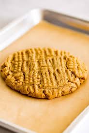 Line 2 rimmed baking sheets with parchment paper. One Peanut Butter Cookie For Two Baking Mischief