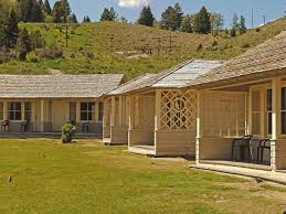 Book Your Stay In Yellowstone National Park Today Mammoth Hot Springs Hotel Amp Cabins F National Park Lodges Yellowstone Vacation Yellowstone National Park