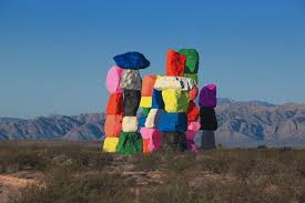 Seven 30 Foot Tall Dayglow Totems Placed In The Desert By Ugo Rondinone Desert Art Seven Magic Mountains Colorful Art Installations