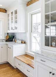 Get free shipping on qualified white kitchen cabinets or buy online pick up in store today in the kitchen department. Love The Window Seat Under Low Window To Keep Cabinets Going Farmhouse Kitchen By The Working Kitchen Seating In Kitchen Window Seat Kitchen Kitchen Design