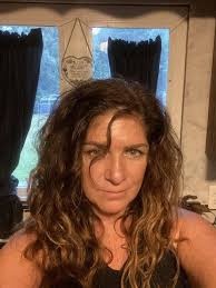 I'm 58 and was letting my hair go grey. Oh yuck! 😂 So I went and got my  hair colored plum with red undertones. I've always wanted purple hair and a  tattoo